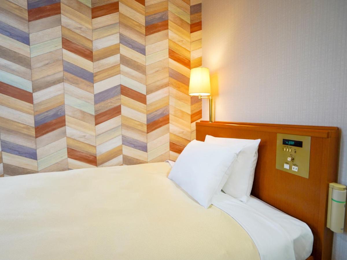 Hotel New Gaea Iizuka Bagian luar foto
